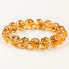 Honey Light — Yellow Quartz Bead Bracelet on a warm ivory background
