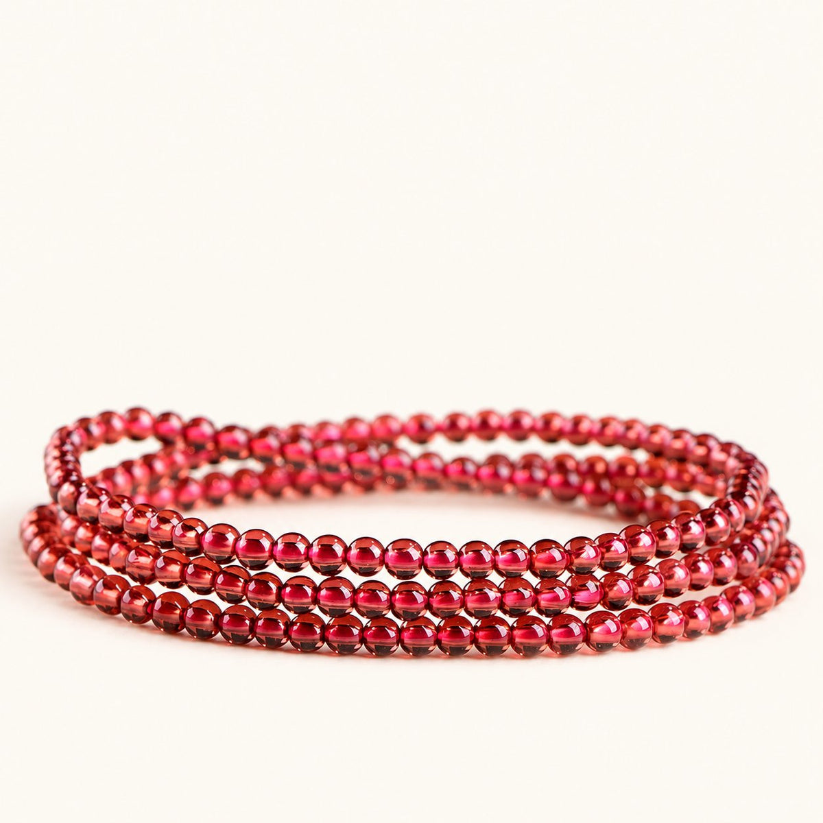 Champagne Orbit — Garnet Wrap Bracelet — Alora Gems product photograph