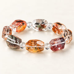 Garden Prism — Faceted Floral Phantom Quartz Bracelet on a warm ivory studio background