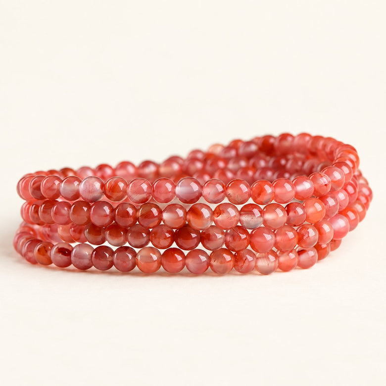 Ember Orbit — Red Agate Wrap Bracelet — Alora Gems product photograph