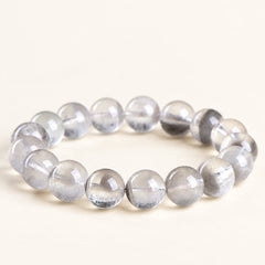Grey Constellation — Phantom Quartz Bead Bracelet, product detail on warm ivory