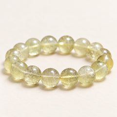 Desert Gold — Golden Glass Bead Bracelet, product detail on warm ivory