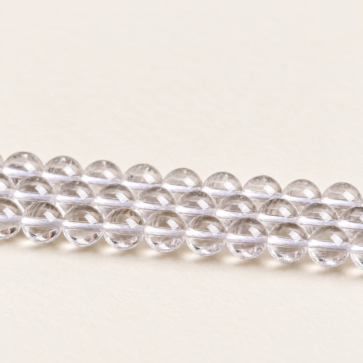 Crystal Reserve — Clear Quartz Round Beads — Alora Gems product detail