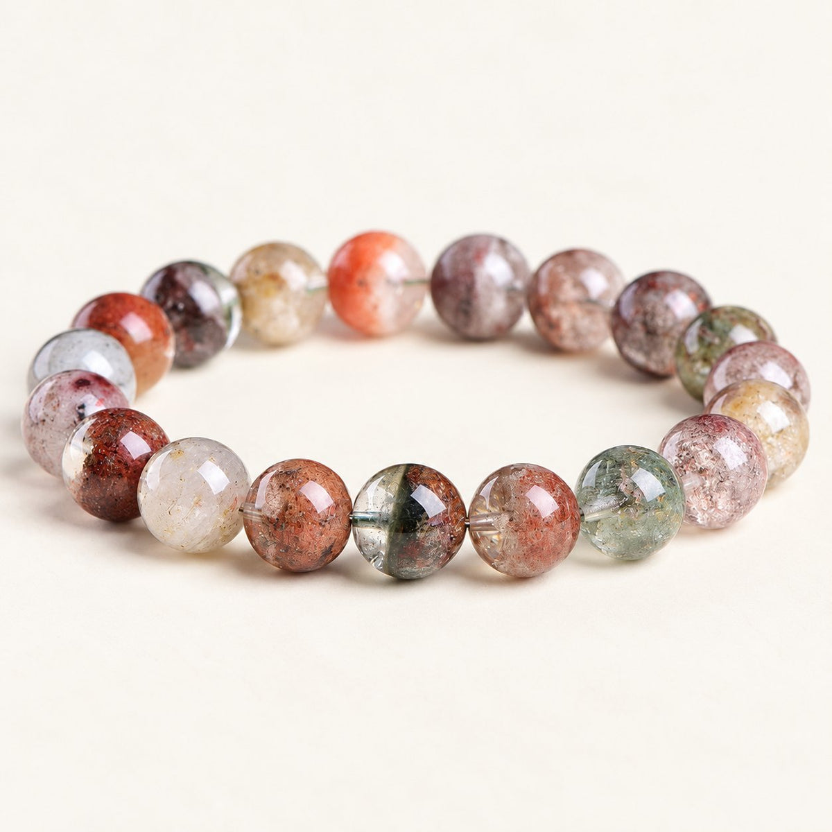 Garden Mist — Floral Phantom Quartz Bead Bracelet on a warm ivory background