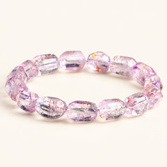 Plum Facets — Super Seven Quartz Barrel Bracelet — Alora Gems product photograph