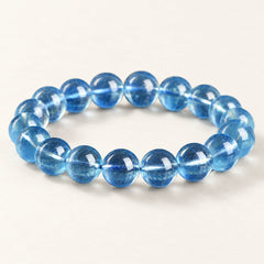 Sea Glass — Aquamarine Round Beads on a warm ivory background