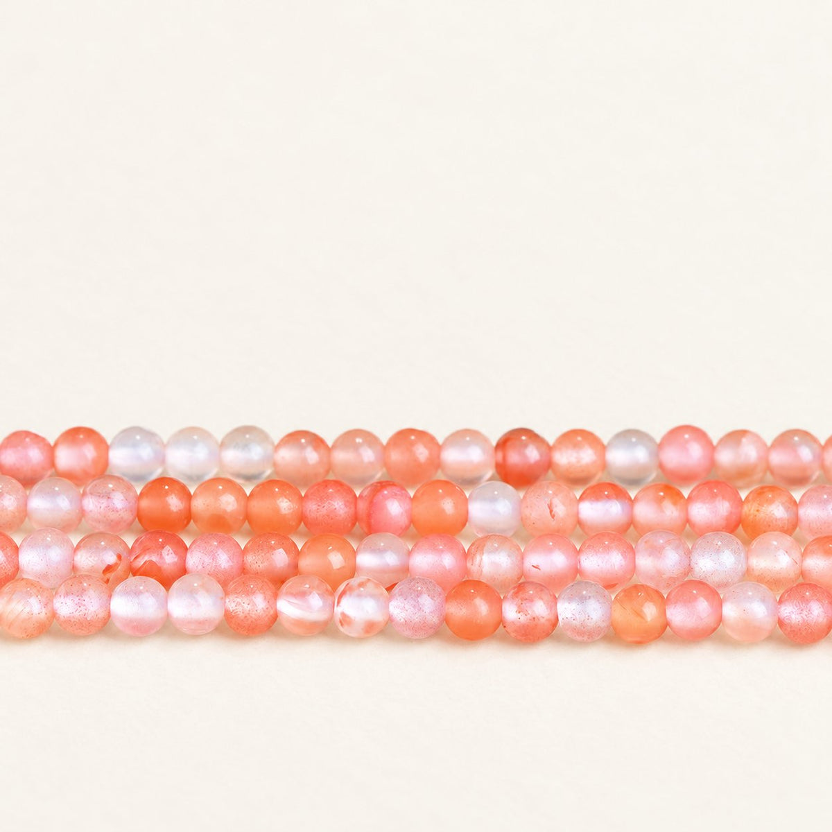 Scarlet Flecks — Red Agate Small Round Beads — Alora Gems product photograph