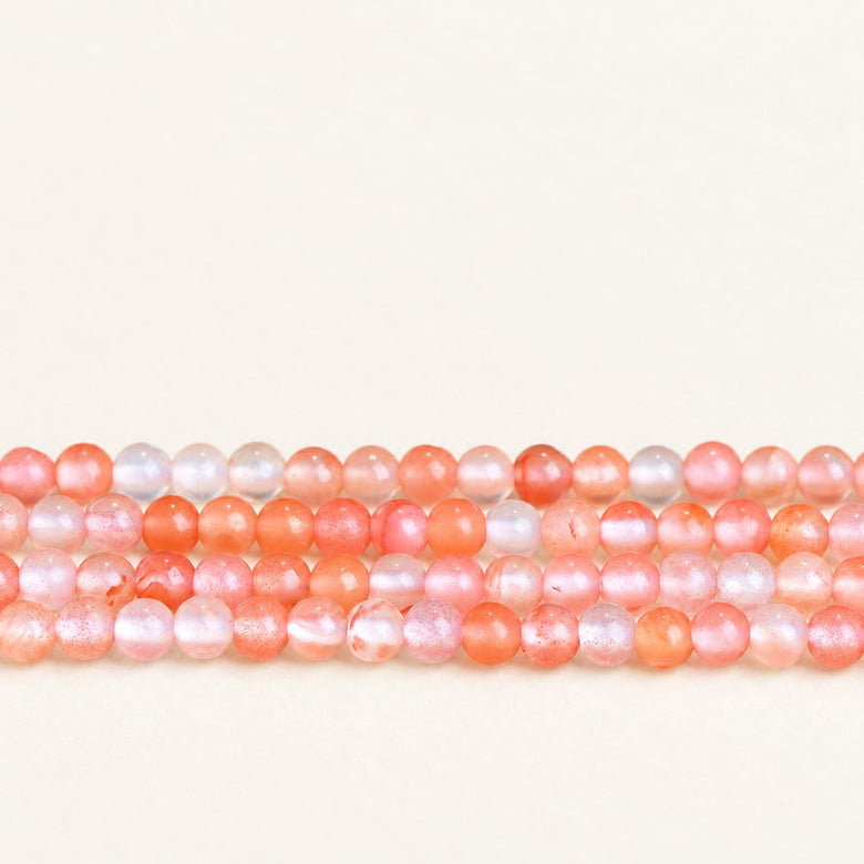 Scarlet Flecks — Red Agate Small Round Beads — Alora Gems product photograph