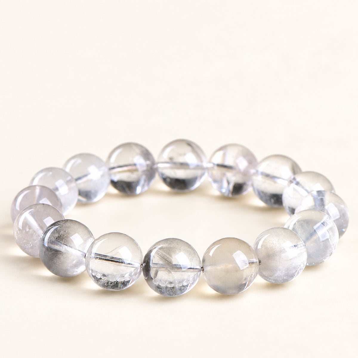 Grey Constellation — Phantom Quartz Bead Bracelet, product detail on warm ivory