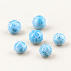 Ocean Mosaic — Larimar Round Beads on a warm ivory background