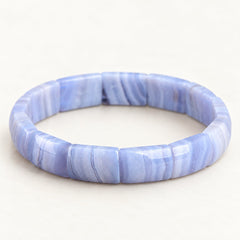 Blue Current banded agate panel bracelet on a warm ivory background
