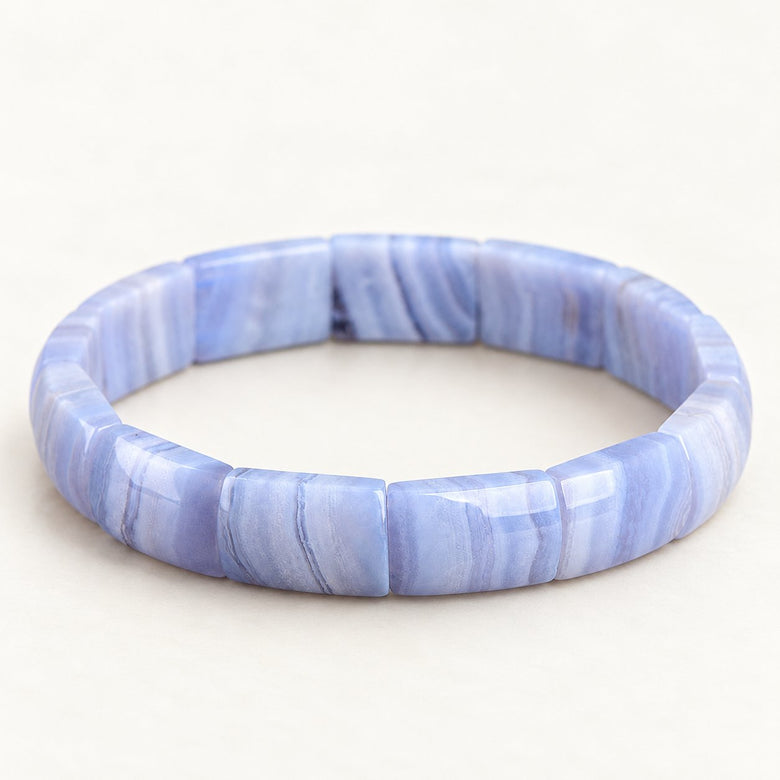 Blue Current banded agate panel bracelet on a warm ivory background