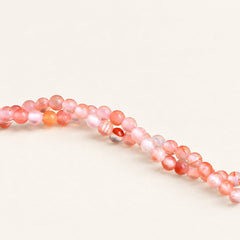 Scarlet Flecks — Red Agate Small Round Beads — Alora Gems product detail