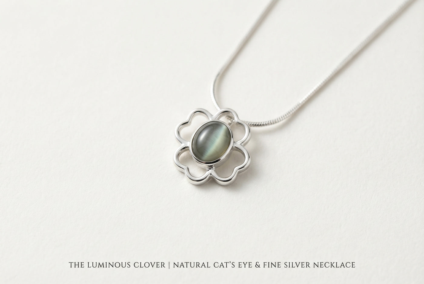The Luminous Clover | Natural Cat's Eye & Fine Silver Artifact | The Archive Collection